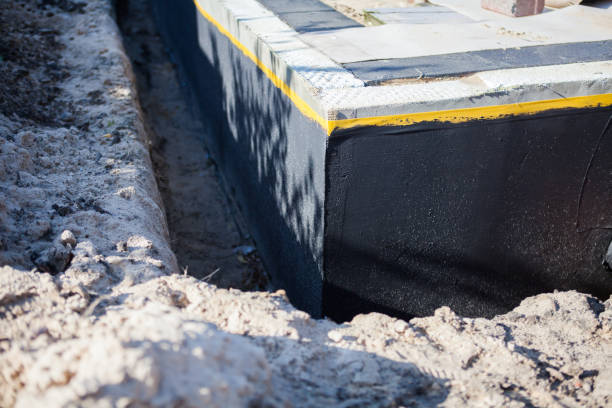 Professional Waterproofing technician working in Dresden, OH